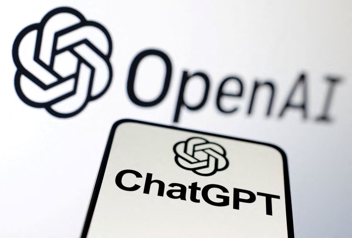 Logo of Open AI with a mobile phone with chatgpt on it