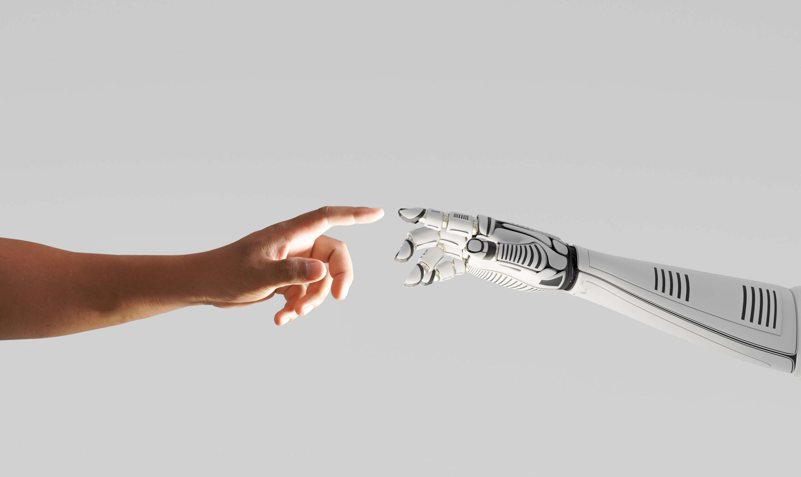 A human hand and a Robot arm touching